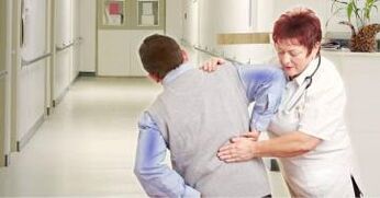 Comharthaí agus cóireáil osteochondrosis an lumbar